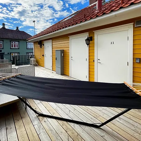 Vibrant On Bustling Street, Above A Restaurant Perfect For Tourists, Stavanger